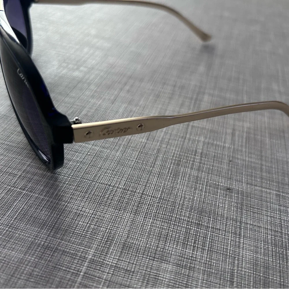 Cartier Black Frame Sunglasses with Purple Gradient Lenses and Gold Accent